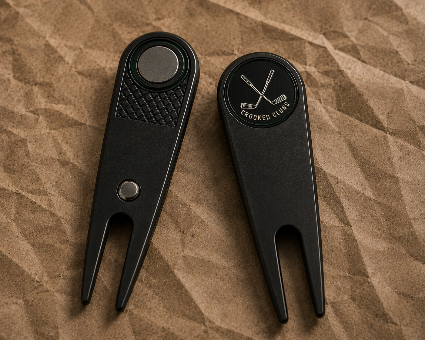 Black switchblade-style divot tool with a Fix Your Lie marker